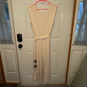 Sleek Cream Long-Sleeve Jumpsuit with Waist Tie